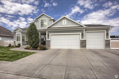 3692 W Hooded Crane Dr, House other with 6 bedrooms, 3 bathrooms and 8 parking in Clinton UT | Image 2