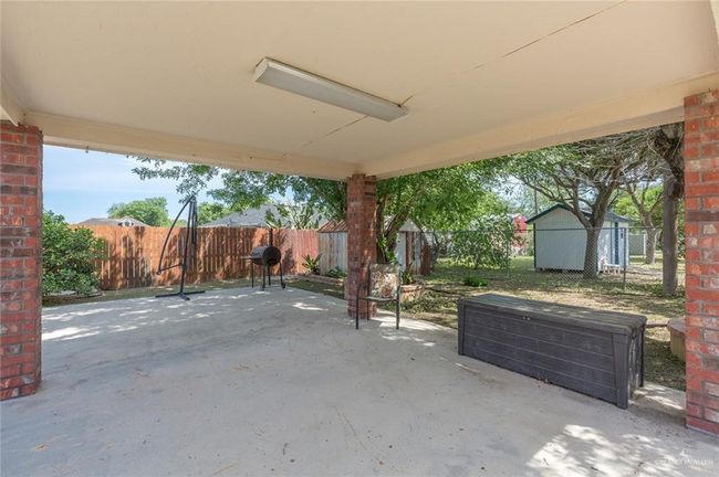 View of patio / terrace featuring a fenced backyard | Image 10