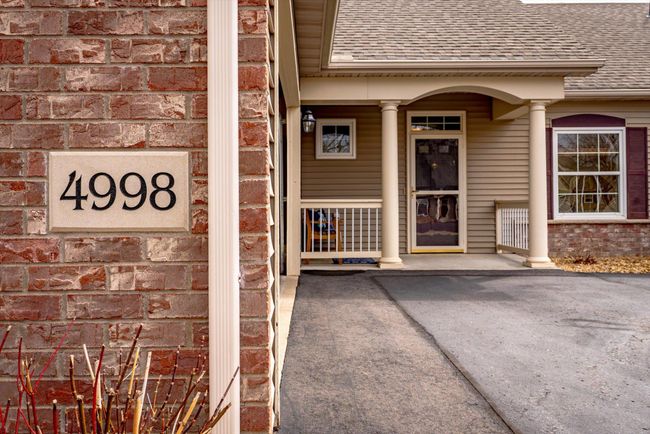 Welcoming front entry with a private porch and easy, no-stair access. | Image 4
