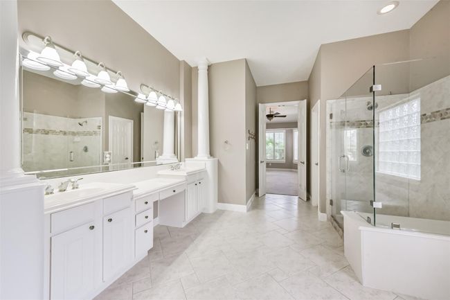 Luxury Primary Bathroom with jacuzzi tub and huge closet | Image 20