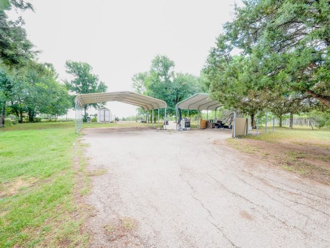 View of asphalt driveway | Image 7
