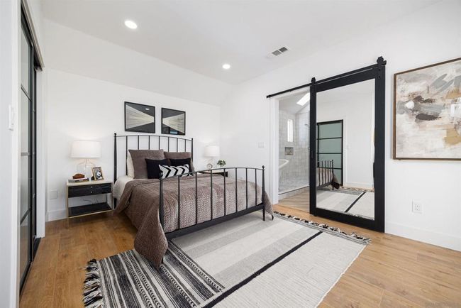 Primary bedroom with deck overlooking the ocean | Image 28
