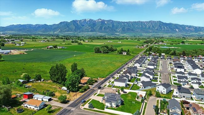 Aerial view of residential area featuring a mountainous background | Image 29