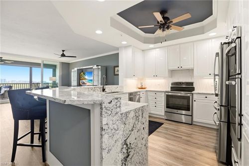 1002-425 Cove Tower Dr, NAPLES, FL, 34110-6507 | Card Image