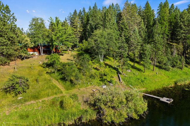 Back of property between house & lake | Image 81
