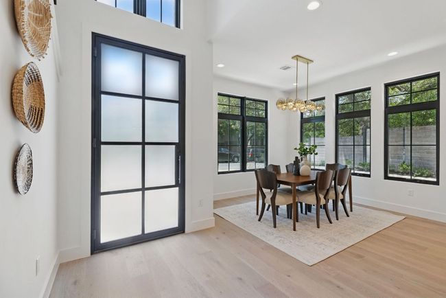 Dining space featuring a chandelier, baseboards, recessed lighting, and light wood-style flooring | Image 4