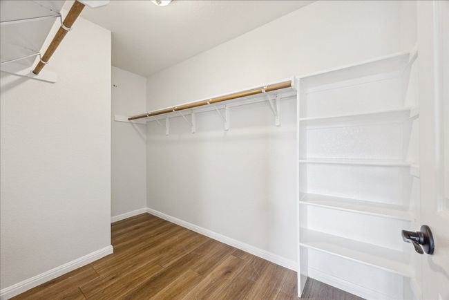 Spacious closet with built-in shelving | Image 18