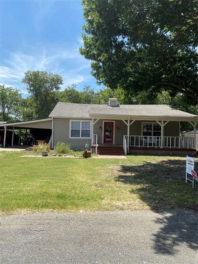 View of front of house with a carport and a porch | Image 3