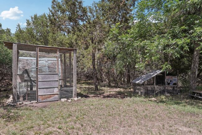 View of yard featuring an outdoor structure and exterior structure | Image 37