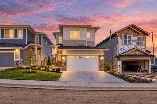 183 Heritage Crt, House with 4 bedrooms, 4 bathrooms and 4 parking in Cochrane AB | Card Image
