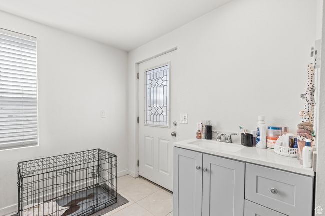 Foyer entrance featuring light tile patterned floors | Image 18