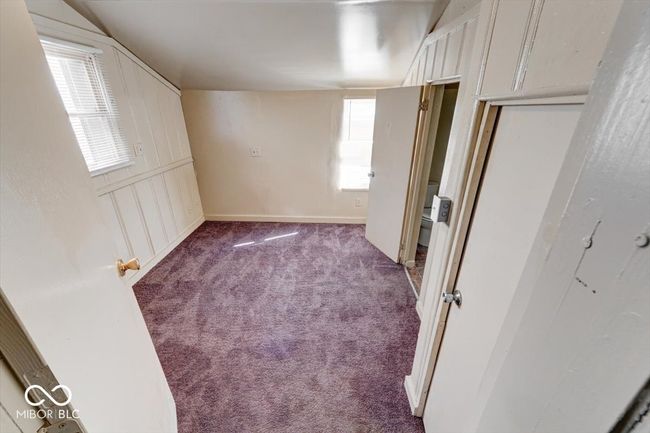 unfurnished bedroom featuring carpet flooring | Image 14