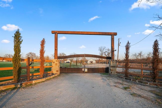 The gated entrance offers privacy and a sense of arrival—welcoming you home to this one-of-a-kind property. | Image 45