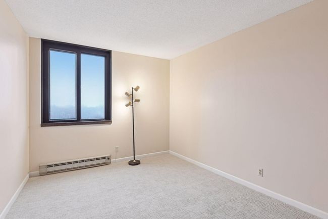 This bright bedroom has new soft carpet, a large window with great views. | Image 6