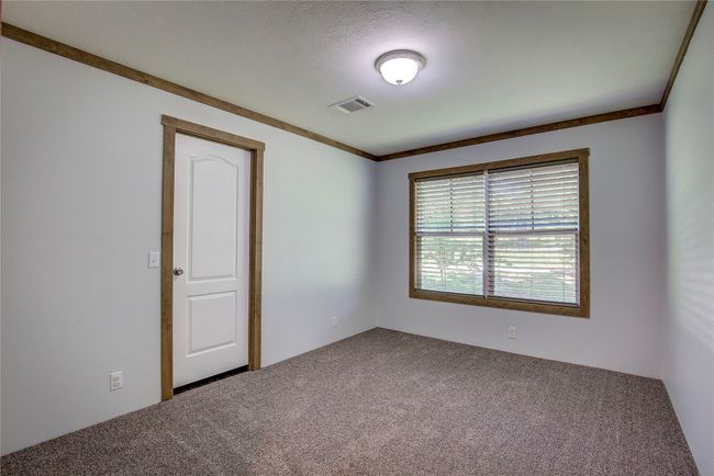 Spare room featuring carpet | Image 20