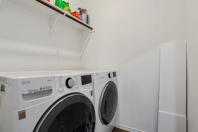Clothes washing area with washing machine and dryer and laundry area | Image 23