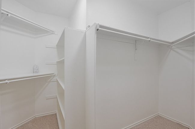 View of walk in closet | Image 17