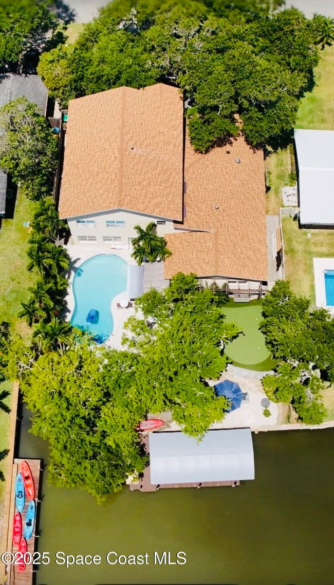 52 Riverview Ln, House other with 5 bedrooms, 3 bathrooms and null parking in Cocoa Beach FL | Image 4