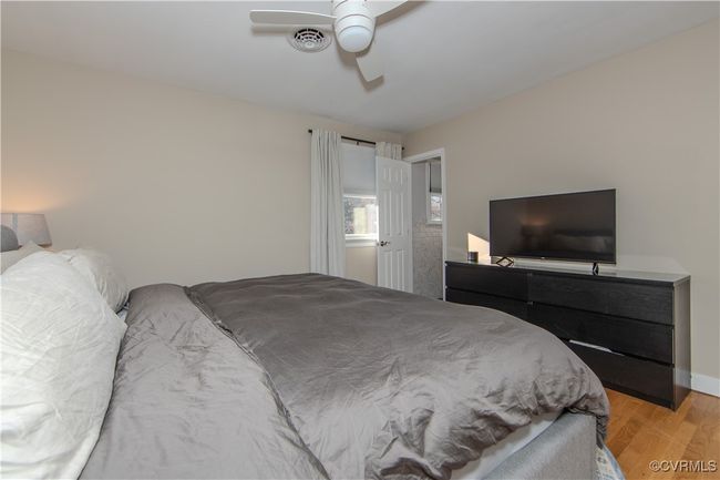 Bedroom featuring ceiling fan and light hardwood / wood-style flooring | Image 25