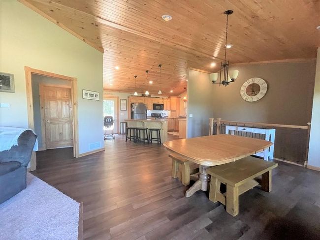 Dining and kitchen area. | Image 4