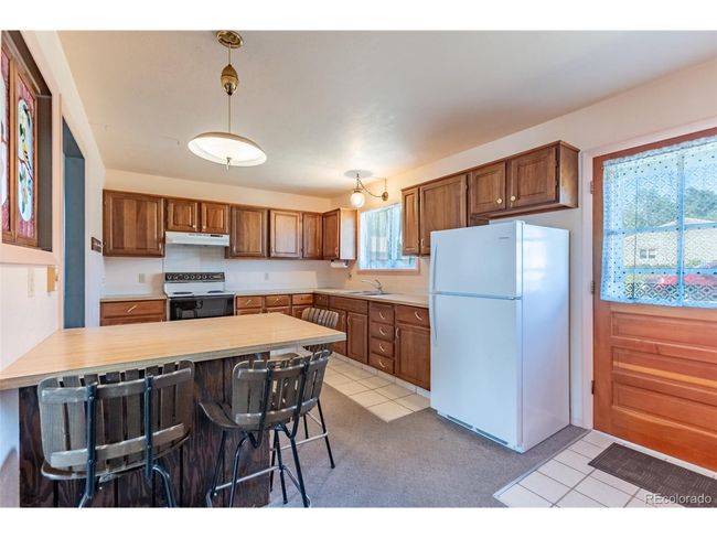 13705 County Road 45, House other with 3 bedrooms, 2 bathrooms and null parking in Coaldale CO | Image 8