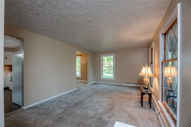 Front entry into living room | Image 4