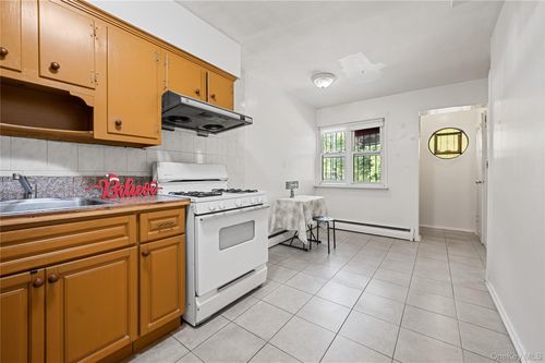 152 Peck Ave, Flushing, NY, 11355-5551 | Card Image