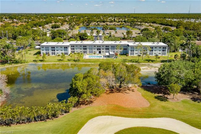 Drone / aerial view with view of golf course and a water view | Image 46