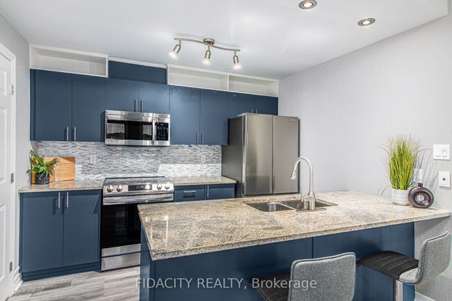 K - 139 Harthill Way, Condo with 2 bedrooms, 2 bathrooms and null parking in Ottawa ON | Image 6