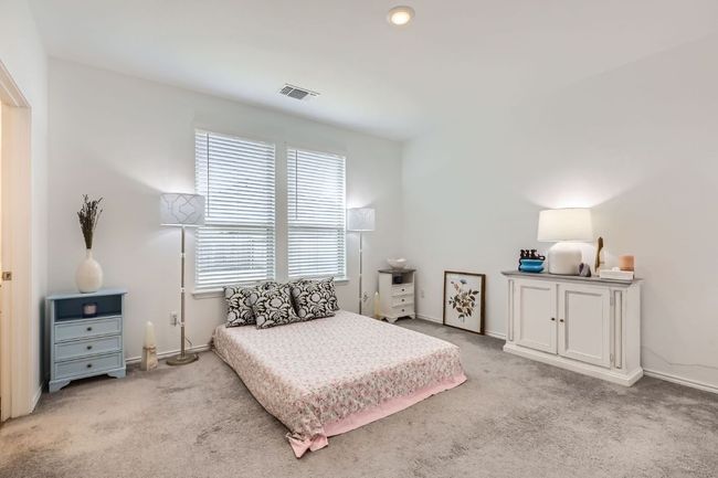 Bedroom featuring carpet flooring and baseboards | Image 14
