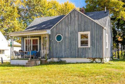 View of front of home with a front yard and a porch | Image 2