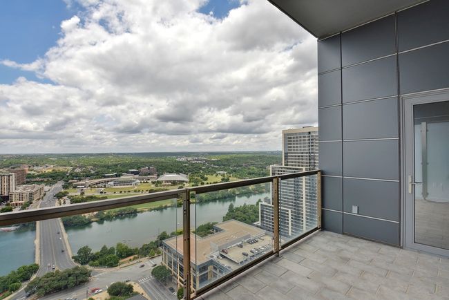 Balcony featuring a water view | Image 19