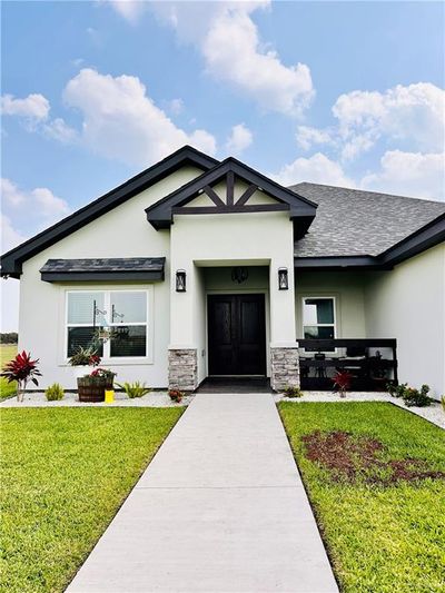 View of front of house featuring a front lawn | Image 3