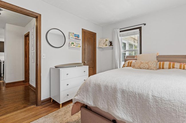 Bedroom two has two windows and hardwood floors | Image 21