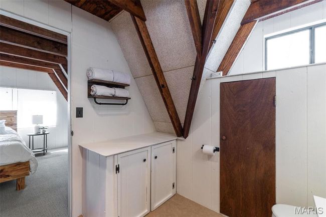 Bathroom with vaulted ceiling with beams and toilet | Image 22