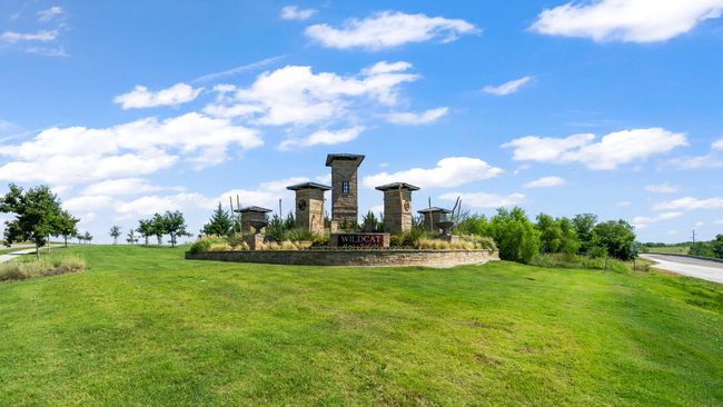 View of property's community featuring a yard | Image 32
