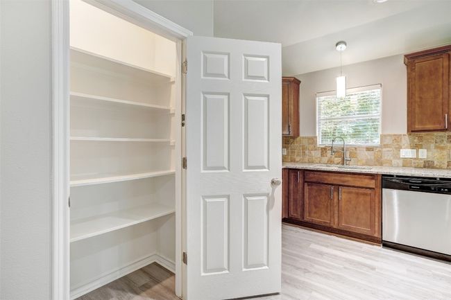 Pantry storage area with lighting | Image 15