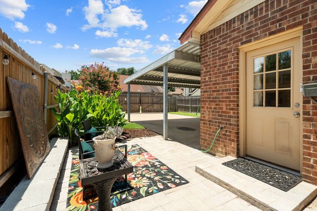 Fenced backyard featuring a patio | Image 26