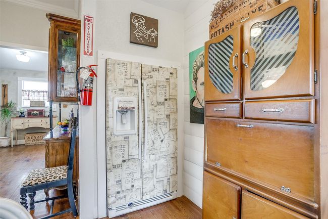 Vintage pie kitchen serves as pantry with built in Refrigerator under the stairwell | Image 12