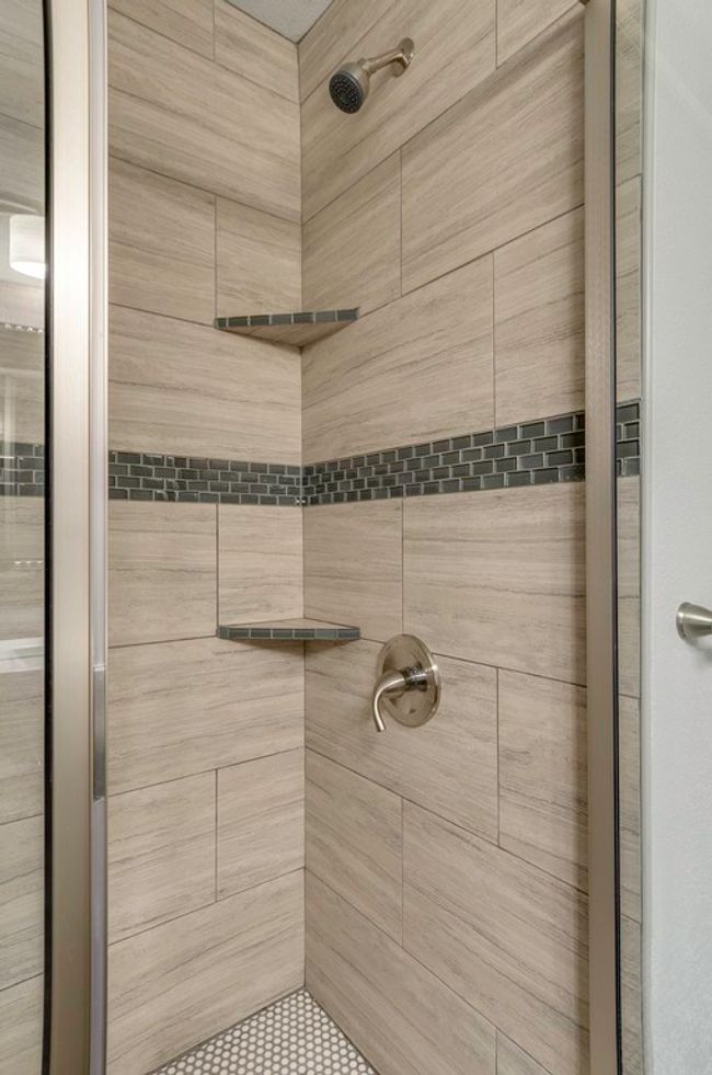 Full bath featuring a tile shower | Image 33