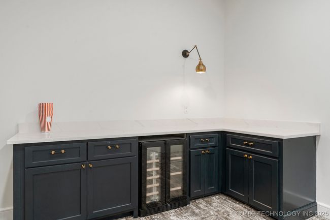 Upstairs game room or theatre room with bathroom | Image 63