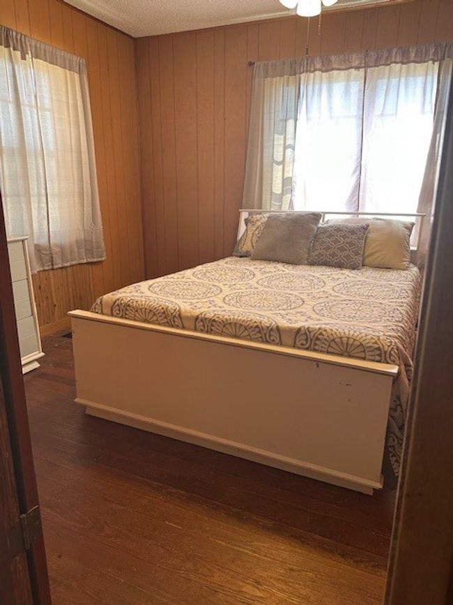 Front Bedroom with original wood floors | Image 9