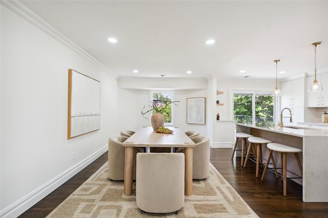 Dining space featuring crown molding, healthy amount of natural light, recessed lighting, and dark wood-style floors | Image 4