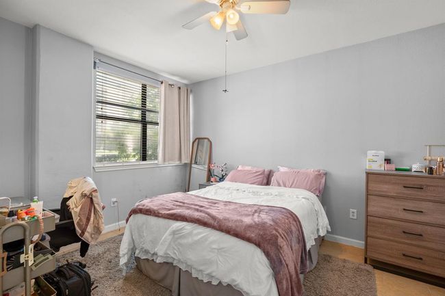 Bedroom with baseboards and a ceiling fan | Image 13