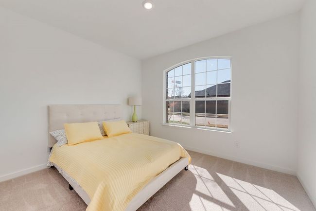 Bedroom featuring light colored carpet and recessed lighting | Image 17