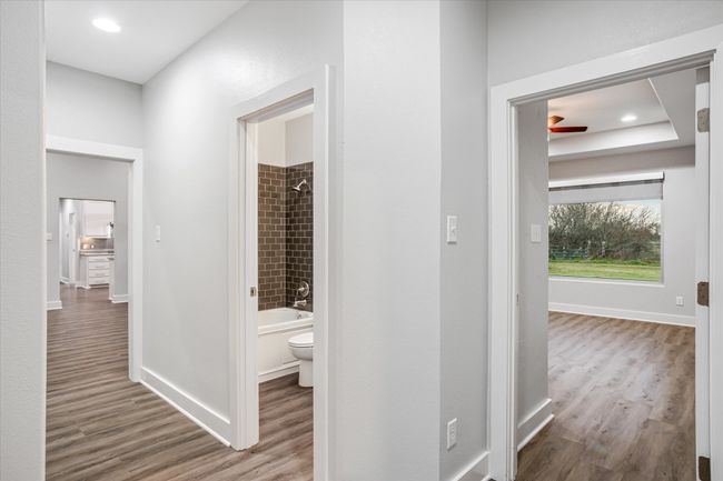 Corridor with hardwood / wood-style flooring | Image 20