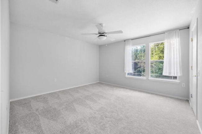 Carpeted spare bedroom | Image 20