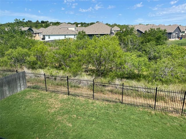 View of yard from main bedroom | Image 4