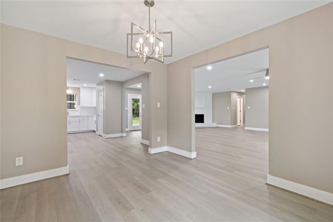 Breakfast room view of the kitchen, living/family area. | Image 29