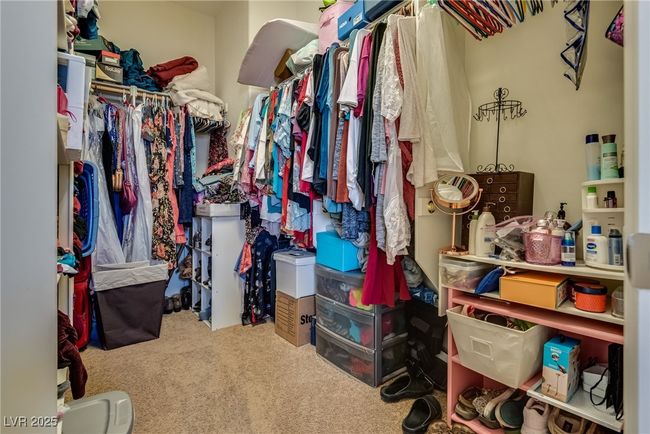 Spacious closet with carpet floors | Image 50